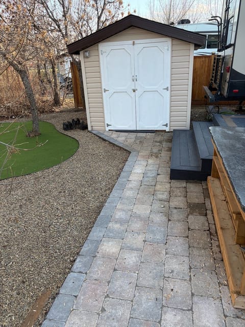 After the spring cleanup: Paver path to the shed